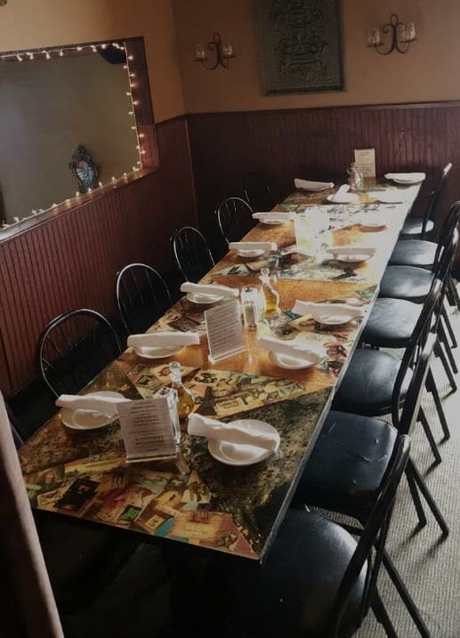 The upstairs private dining room set for a group at Bacchus in Richmond's Fan District