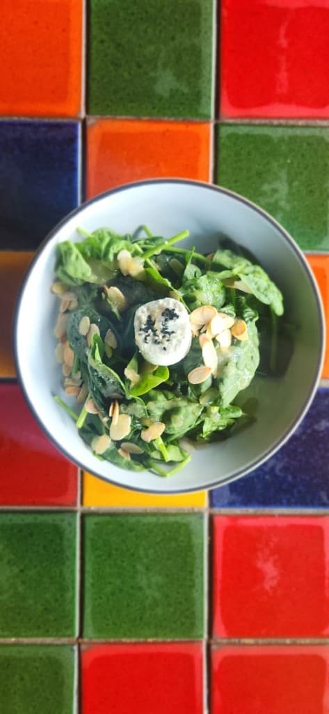 Spinach salad with green apple vinaigrette, goat cheese, and toasted almonds at Bacchus, Italian restaurant in Richmond VA