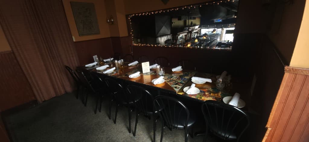 The upstairs private dining room set for a group at Bacchus in Richmond's Fan District